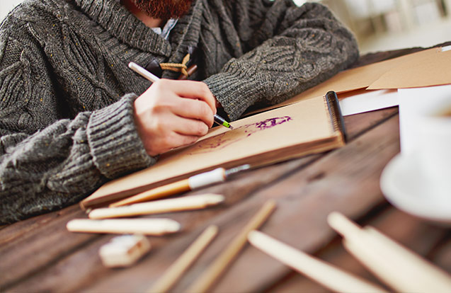 man_writing graphic designer designing